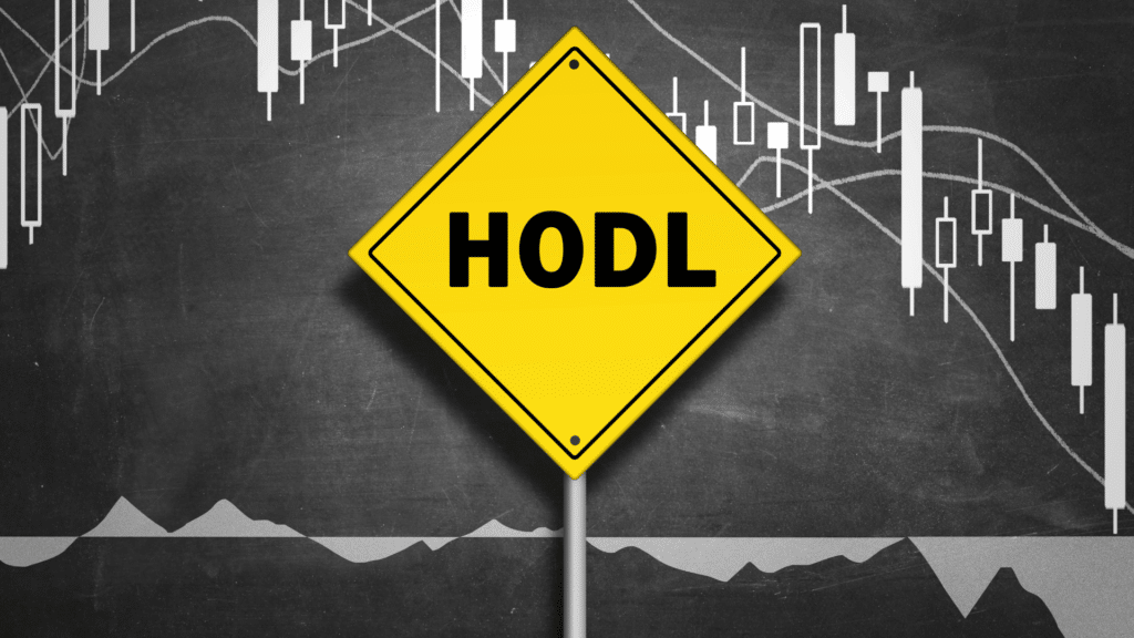 yellow sign that reads HODL